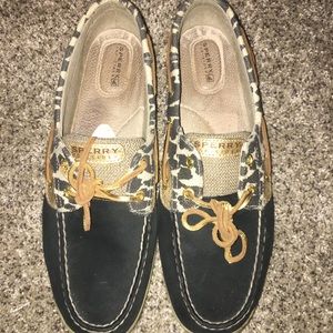 Black and gold leopard boat shoes.